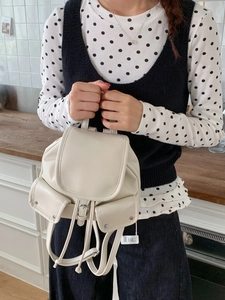 Chic cream white PU leather backpack with drawstring closure and adjustable straps