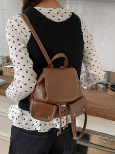 Vintage brown PU leather mini backpack with drawstring closure and contrast stitching