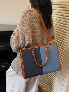 Summer 2025 patchwork denim tote bag with brown leather straps and gold metal hardware