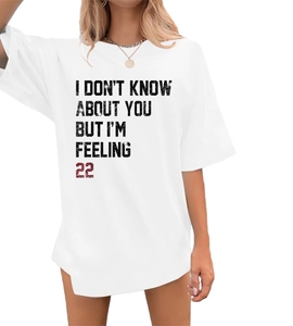 Detail of vintage 'I DON'T KNOW ABOUT YOU BUT I'M FEELING 22' print on white cotton T-shirt