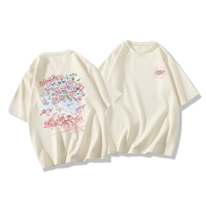Detail view of cotton T-shirt featuring pink floral and mountain back print design