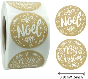 Close-up of 1.5 inch Christmas kraft stickers roll with white Noel and snowflake patterns