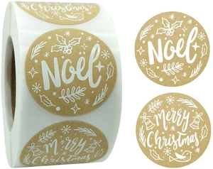 Detail of round kraft Christmas stickers with Noel and Merry Christmas printed in white