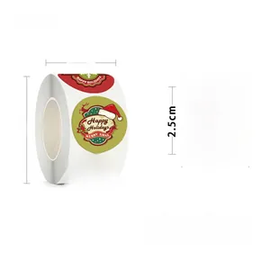 Detail showing 2.5cm Christmas stickers roll dimensions and festive deer tree patterns