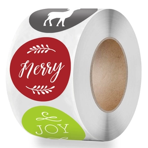 Roll of Christmas Merry and Joy decorative round stickers with reindeer motifs