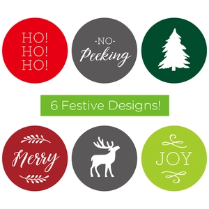Christmas gift stickers roll with festive tree and reindeer designs for holiday decoration