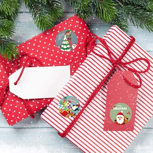 Rouleau d'autocollants ronds Merry Christmas en kraft avec Père Noël et pingouin festif