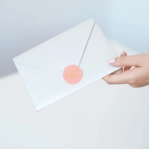 Roll of 1 inch pink gold thank you stickers for gift sealing and packaging decoration