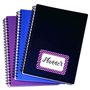 Three-piece spiral notebook set in black, blue and purple with Planner labels