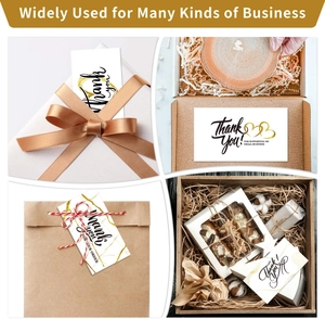 Detail of thank you cards and tags on boxes and bags for small business packaging