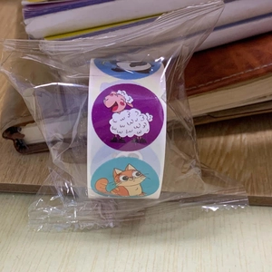 Detail of multi-pattern cartoon animal reward stickers roll for kids craft and scrapbooking