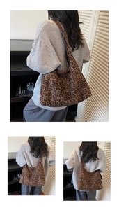 Detail of leopard print hobo tote bag with adjustable brown leather strap worn by model