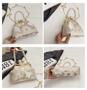 Detailed views of embroidered banquet bag with pearl handle and golden floral patterns