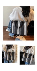 Three-way view of a large striped canvas tote bag with wide black handles and shoulder strap