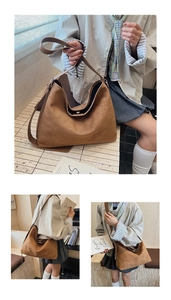 Dettaglio della grande borsa tote in pelle scamosciata marrone con chiusura magnetica interna