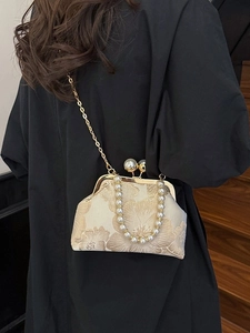 Sac de soirée brodé de style chinois avec poignée perle et bandoulière dorée