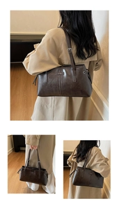 Detail showing deep brown faux leather texture and metallic logo on leopard tote bag