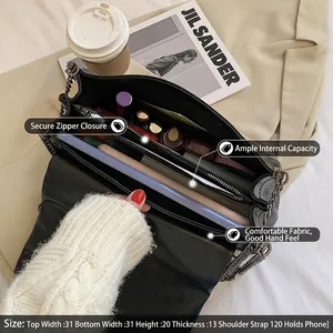 Large black PU leather commuter bag with chain strap and multiple interior compartments