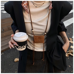 Chic brown suede mini crossbody pouch with wooden bead lanyard and silk scarf detail