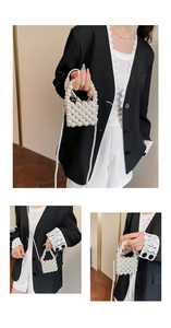 Detail of handmade woven pearl mini bag with lustrous round beads and shoulder strap