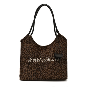 Chic leopard print tote bag with thick velvet fabric and long black shoulder straps