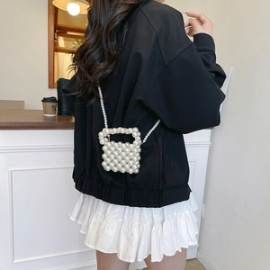 Handcrafted ivory white pearl woven mini crossbody bag with handle and pearl chain strap