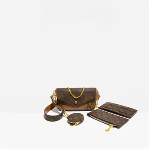 Detail of 4-piece fashion bag set including crossbody and wallet with monogram pattern