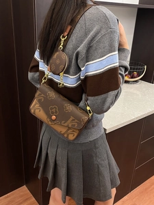 Fashionable brown monogram crossbody bag with chain and small round coin purse charm