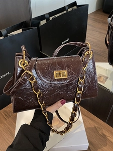 Deep brown oil wax leather shoulder bag with gold chain and vintage metal lock