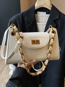 Vintage off-white ruched leather underarm bag with gold chain and twist lock clasp