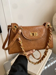 Vintage brown pleated leather baguette bag with gold chain strap and rotary lock buckle