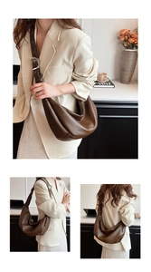 Deep brown leather hobo bag with adjustable silver buckle shown on a beige blazer