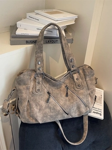 Retro washed leather tote bag with stylish zippers and wide shoulder strap