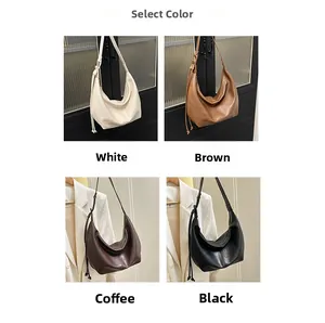 Selection of large vintage Hobo bags in white, brown, coffee, and black colors