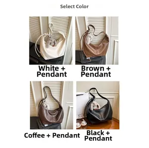 Four vintage faux leather dumpling bags in white, brown, coffee, and black with rabbit charms