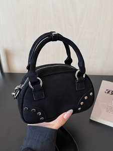 Chic black suede handbag with silver rivets and ring detail for women's autumn style