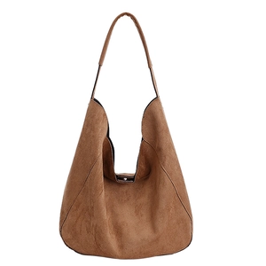 Brown suede hobo bag with a spacious interior and metallic magnetic closure for women