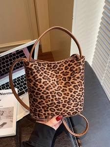 Sac seau vintage à imprimé léopard avec poignées marron et bandoulière fine pour femme
