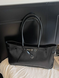 Vintage black faux leather tote bag with metal buckle and large capacity for commuting