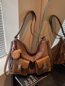 Vintage brown large capacity tote bag with suede texture and bear charm detail