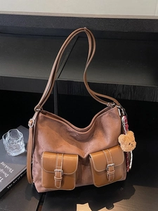 Vintage brown suede hobo tote bag with dual front pockets and cute bear charm pendant