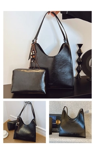 Détail du sac hobo en cuir PU noir brillant avec pochette assortie et pendentif à gland
