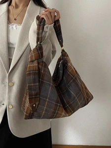 Large color-block wool tote bag with knotted handles and vintage brown plaid design