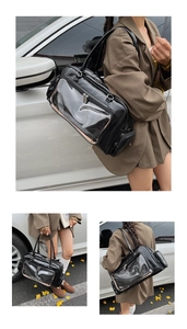Detail of black glossy tote bag with transparent PVC pocket for casual daily commute