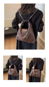 Detail of dark brown leather tote showing the flap closure and functional backpack straps