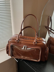 Brown high-shine tote bag with transparent PVC window and adjustable shoulder strap