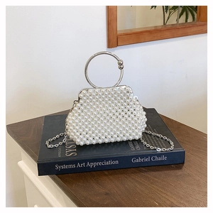 Handmade pearl bead handbag with silver round metal handles and chain strap