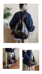 Detail of dark brown vintage tote with gold M logo, wooden bead charm and adjustable straps