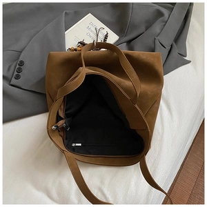 Brown vintage large tote bag in suede material with spacious interior and magnetic closure