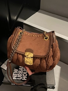 Vintage caramel brown pleated suede shoulder bag with gold clasp and chain strap detail